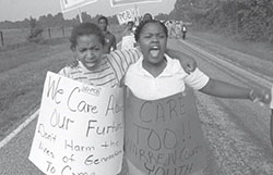 Two young women protesting about the environment